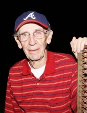 elderly gentleman in red polo shirt and an Atlanta Braves hat